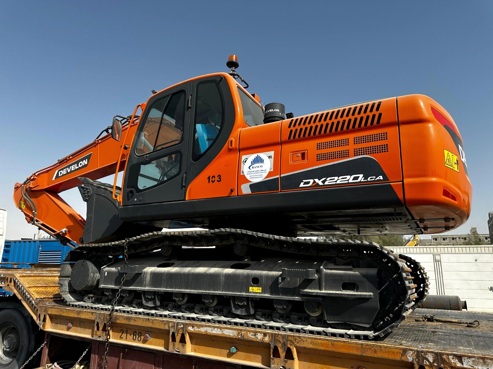 Tracked excavator carrying the RANCO Contracting decal