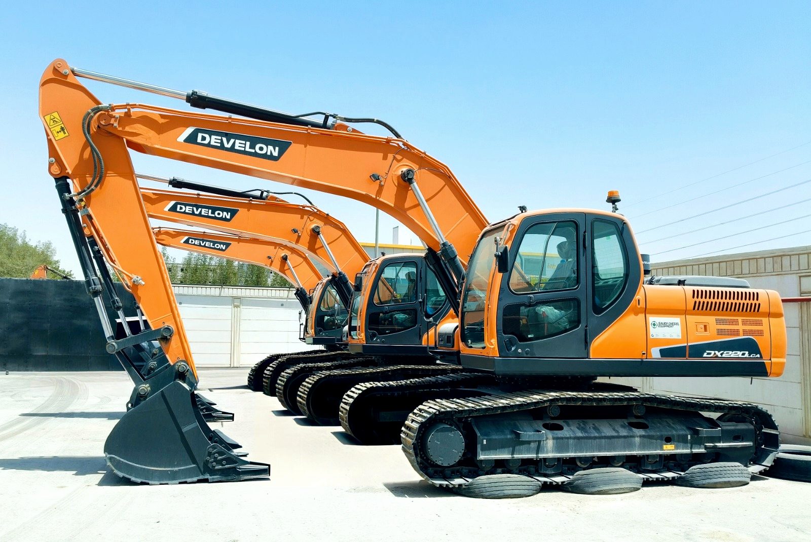 Three tracked excavators carrying the RANCO Contracting decal