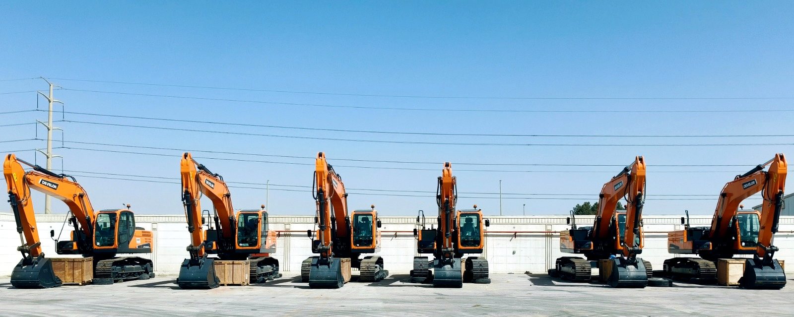 RANCO tracked excavators lined up in the company yard
